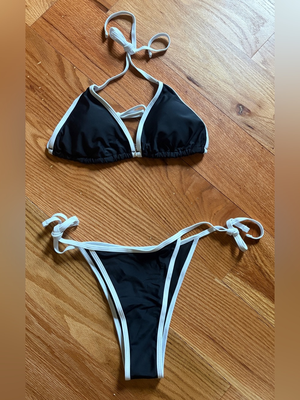 Black & White Triangle String Bikini Top and Bottom. It’s new.
